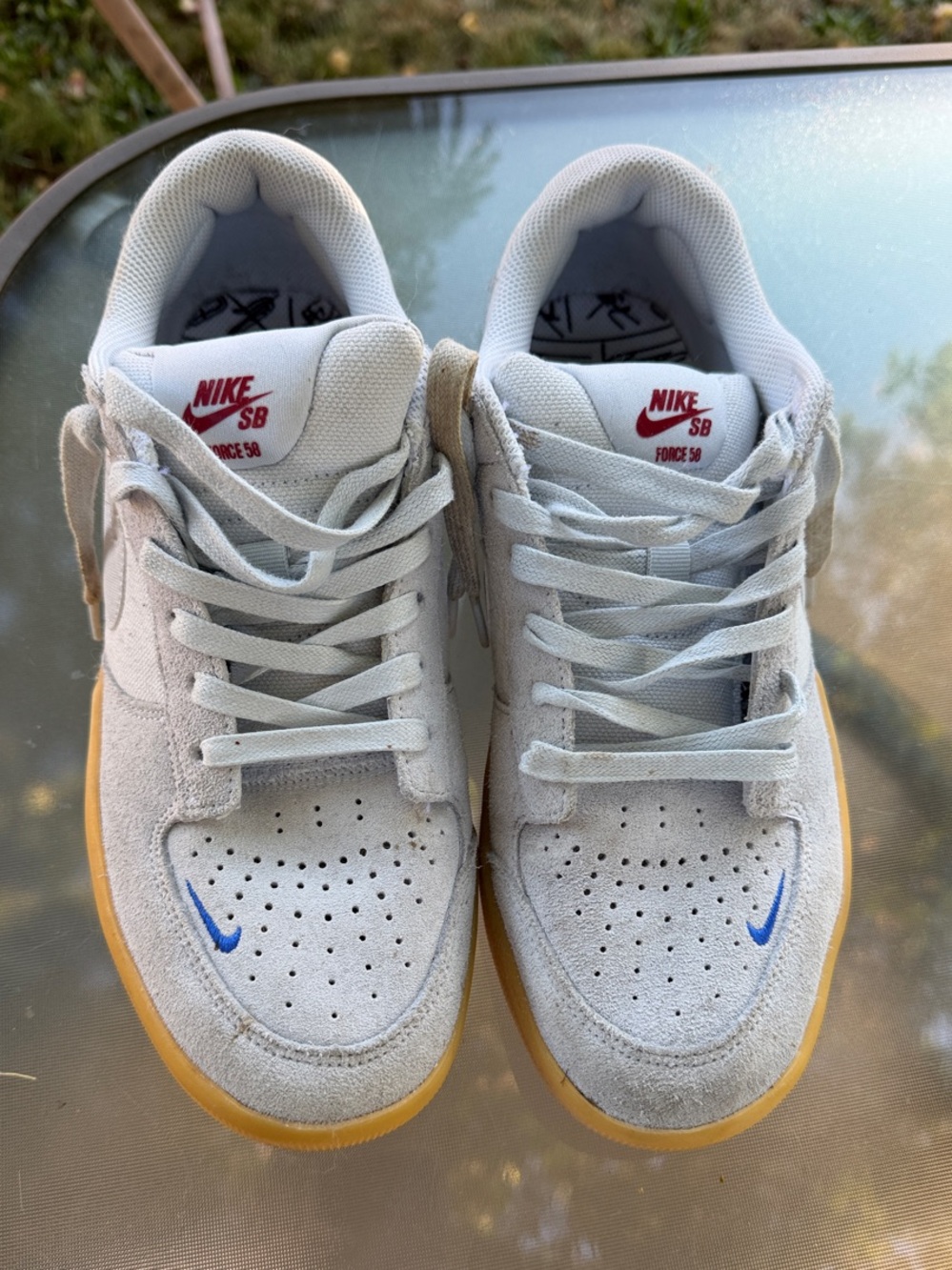 Nike SB Light Gray Suede Sneakers with Gum Sole and Blue Swoosh